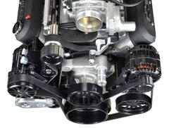 Top front view of black anodized accessory drive system on a Chevy LS engine with a Magnuson supercharger